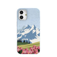 Coque pour iPhone 16 Plus : Montagnes et fleurs bleu poudre